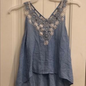 Blue blouse with white flowers